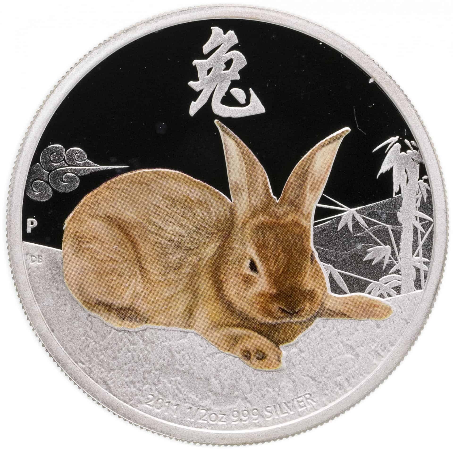 Год кролика человек. Монета год кролика 2023. Год кота и кролика 2023. Серебряная монета год кролика. Кролик символ года.